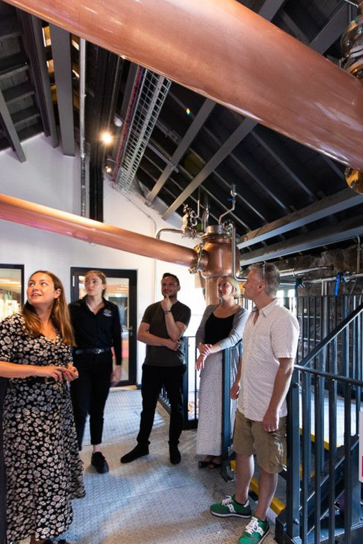 Edinburgh: Holyrood Distillery 'Journey to Whisky' Tour - On the distillery floor with two new make samples