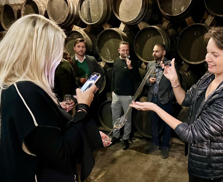 Palma: Distillery Tour with 3 Spirits and Tapas Tasting - Meeting your guide in the Bodegas Suau courtyard