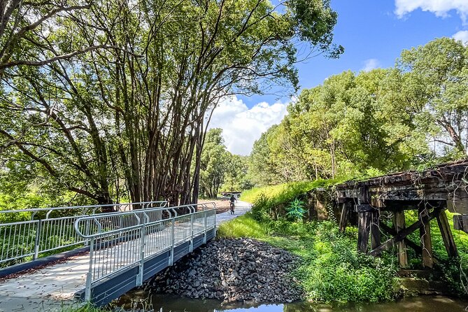 Self Guide E Bike Tour - Husk Distillery, Rainforest & Rail Trail - Burringbar brings the best rail trail stops