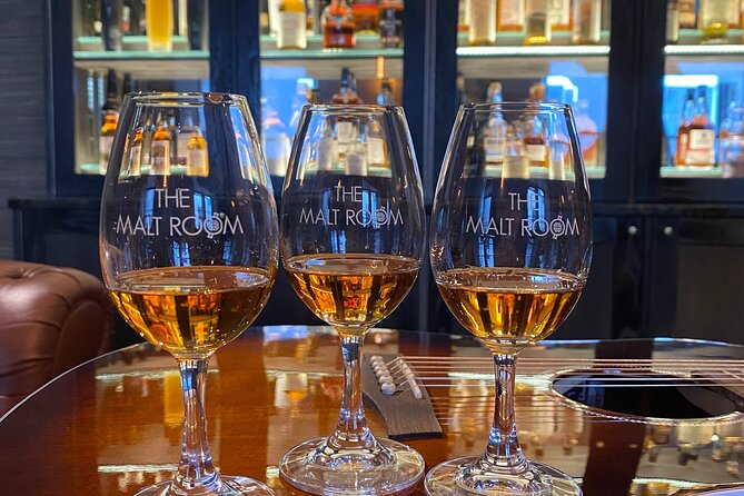 The Malt Room Whisky Gigs - Three malts, one small room, and a Highland singer